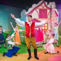 Joe Woolford as Jack Trot with Dancers in Jack and the Beanstalk